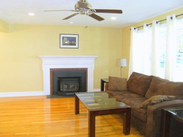 6 Gerald Road Framingham, MA 01701 - Photo 6 of 20 a living room with furniture and a fireplace