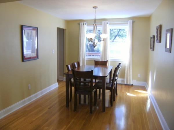 6 Gerald Road Framingham, MA 01701 - Photo 7 of 20 a view of a dining room with furniture window and wooden floor