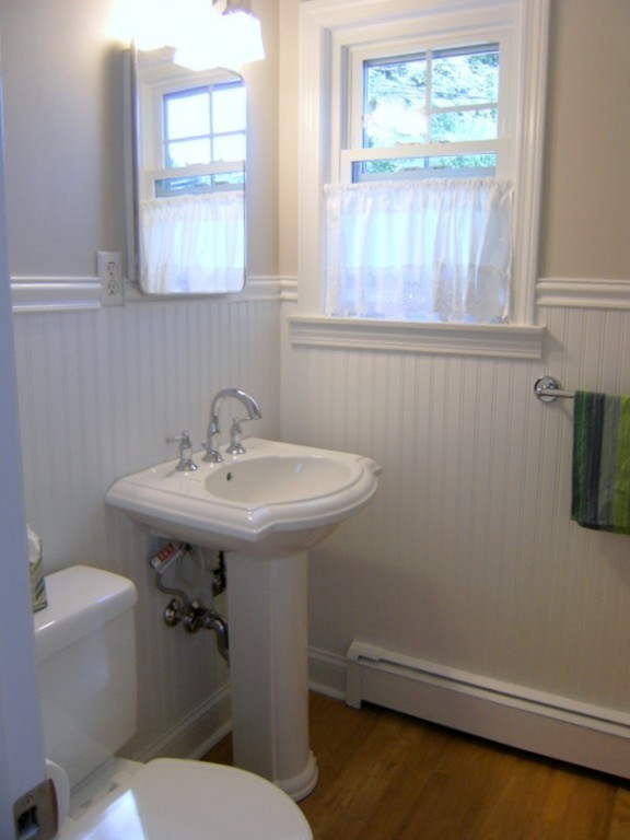 6 Gerald Road Framingham, MA 01701 - Photo 9 of 20 a bathroom with a sink a toilet and a window