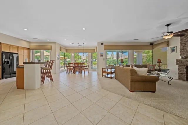 a living room with furniture and a table