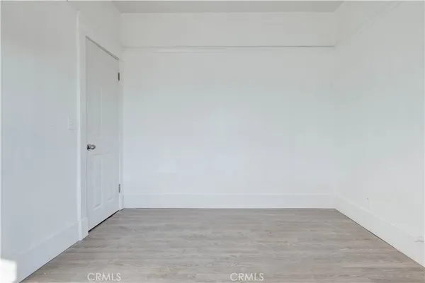 a white bath tub sitting next to a white sink