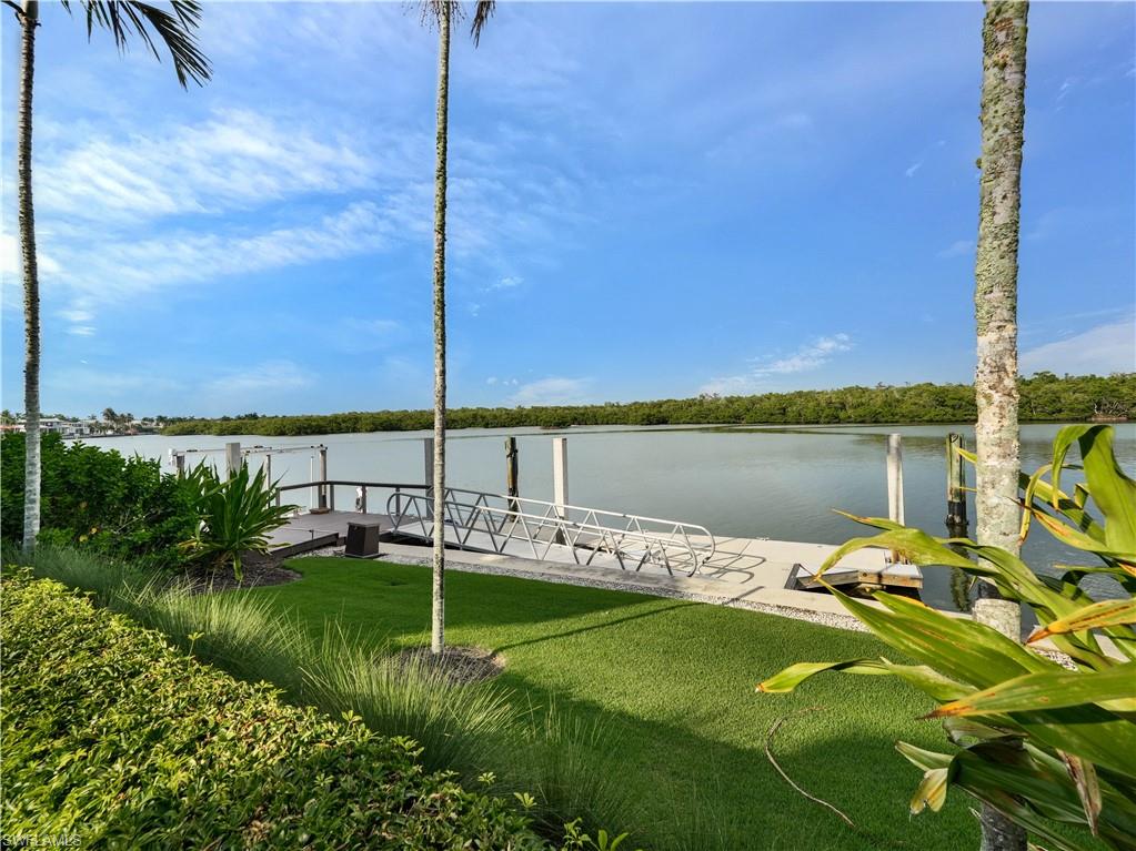 2535 Tarpon Road Naples, FL 34102 - Photo 45 of 50 Mediterranean-inspired residence featuring a terracotta tile roof and white stucco exterior