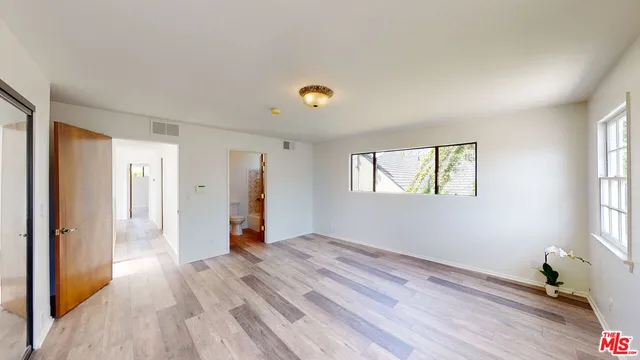 a view of a swimming pool with a lounge chairs