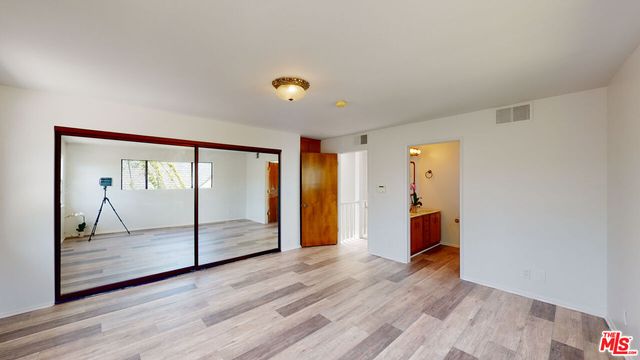a view of a swimming pool with a outdoor seating