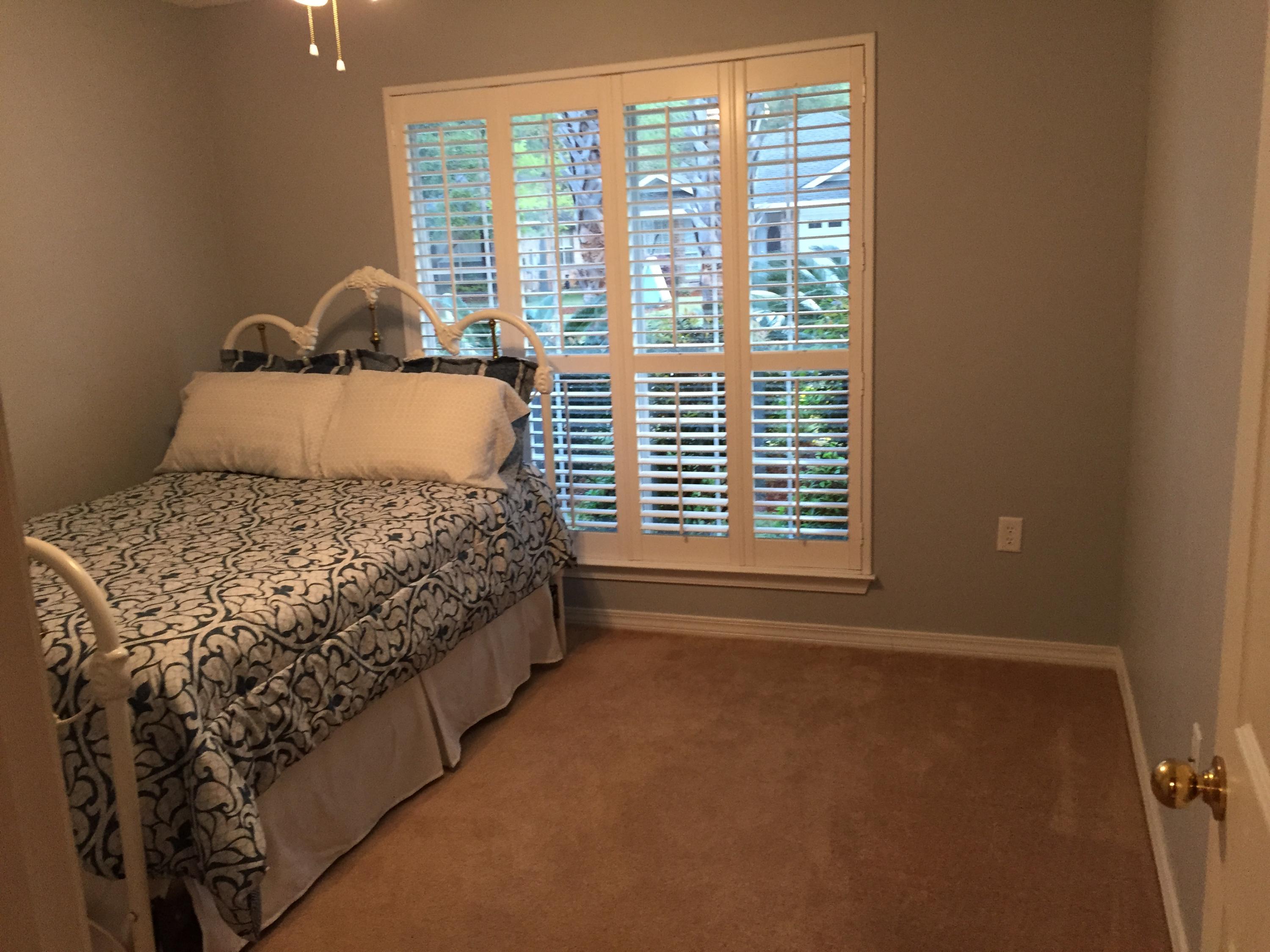 155 Bayou Landing Road Miramar Beach, FL 32550 - Photo 14 of 34 a bed sitting in a bedroom next to a window