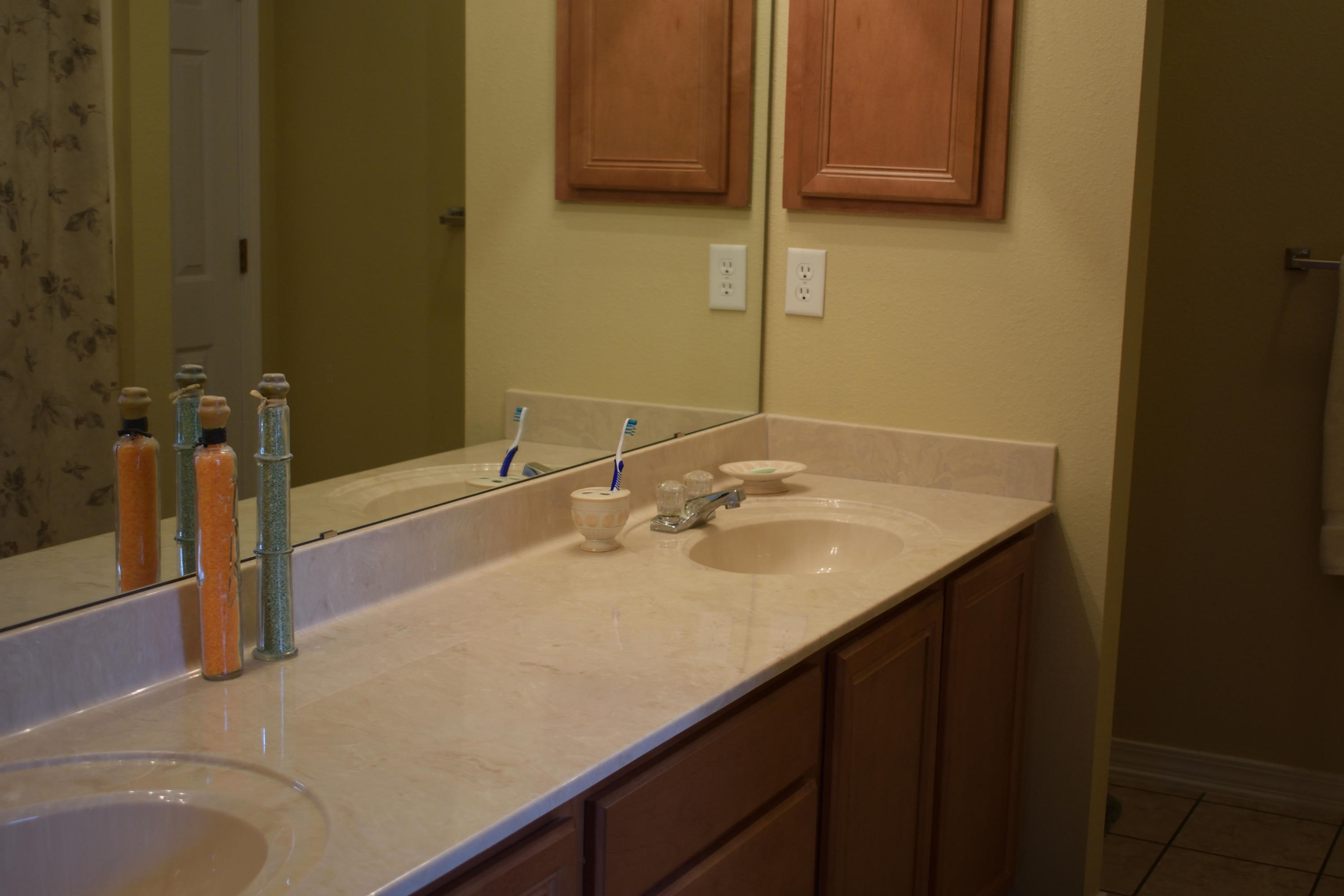 155 Bayou Landing Road Miramar Beach, FL 32550 - Photo 20 of 34 a bathroom with a sink and a mirror