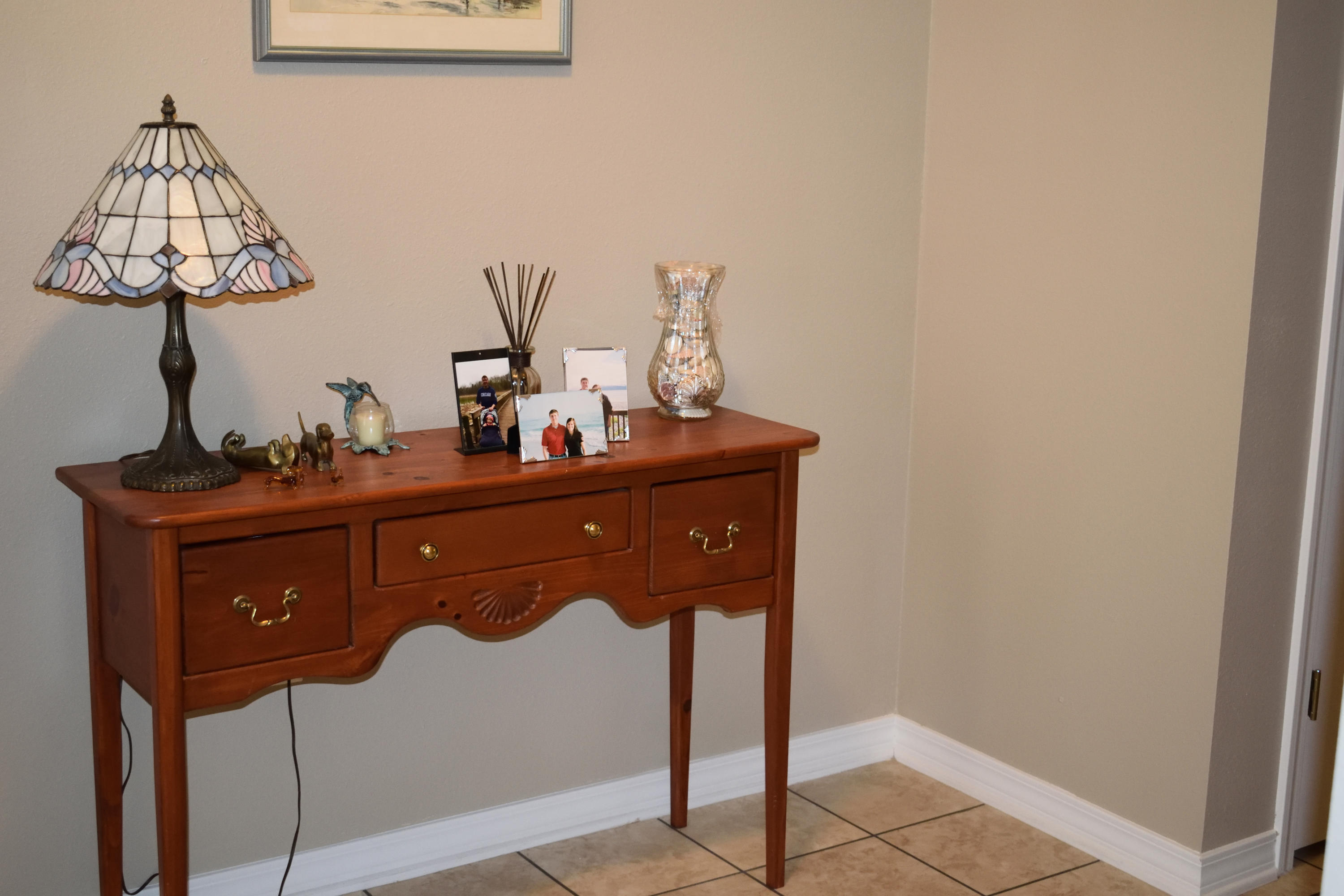 155 Bayou Landing Road Miramar Beach, FL 32550 - Photo 5 of 34 a room with a table and a mirror