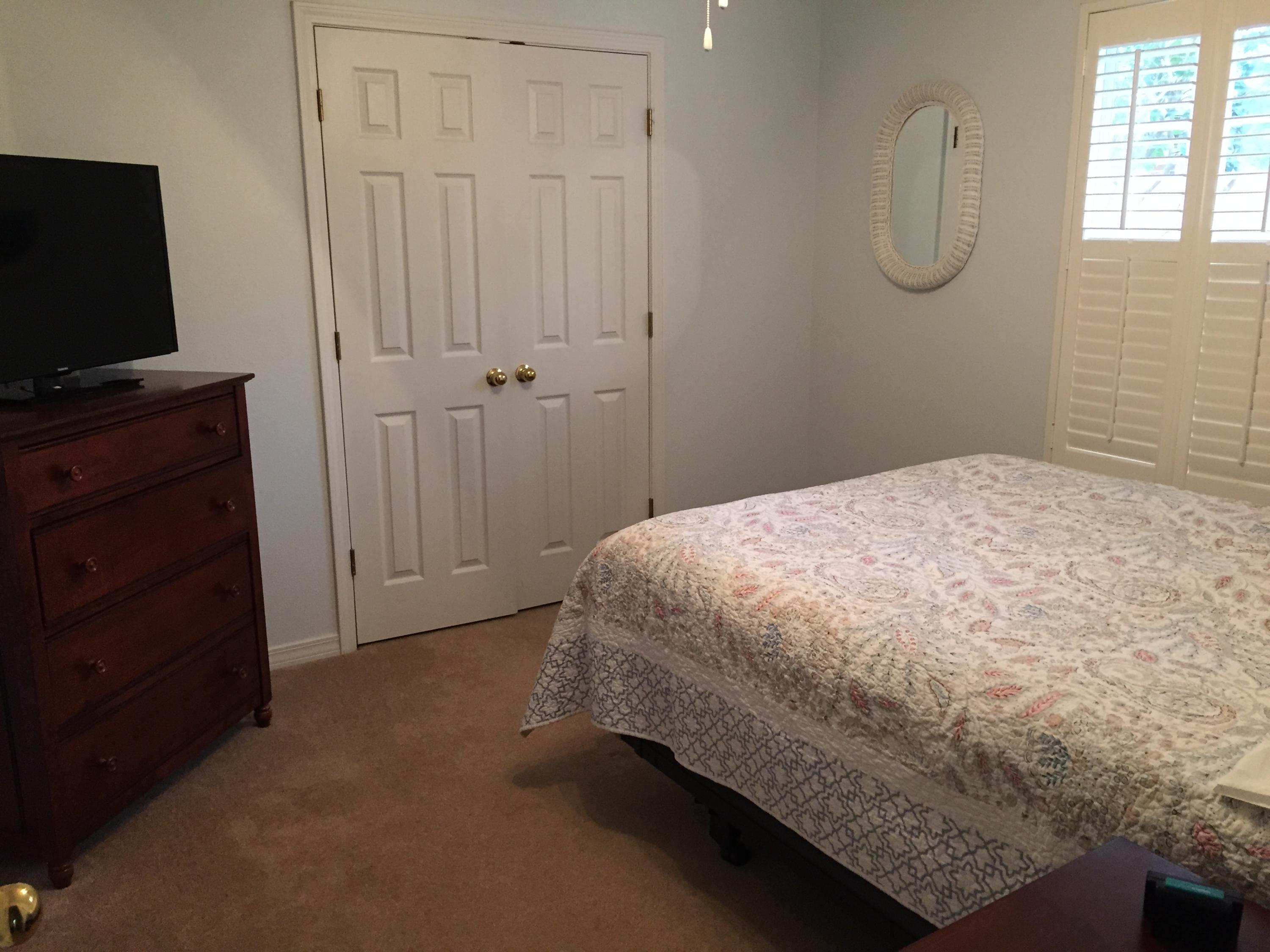 155 Bayou Landing Road Miramar Beach, FL 32550 - Photo 9 of 34 a bedroom with a bed and a flat tv screen on dresser