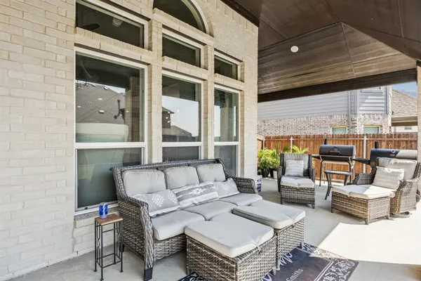 a building outdoor space with patio furniture