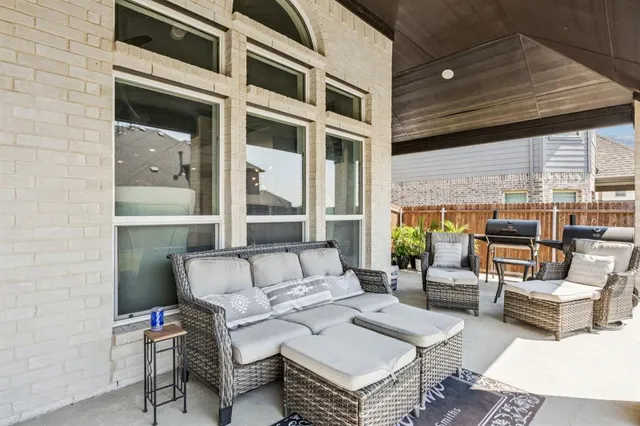 a building outdoor space with patio furniture