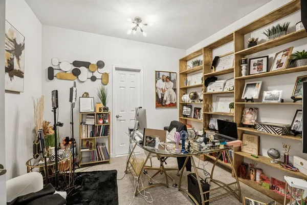 a view of a livingroom with furniture and toys