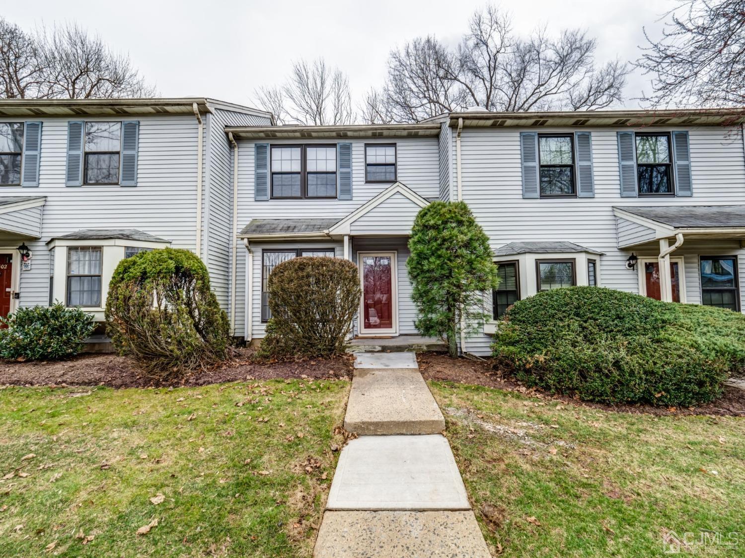 1403 Maplecrest Road Edison, NJ 08820 - Photo 1 of 23 a front view of a house with garden