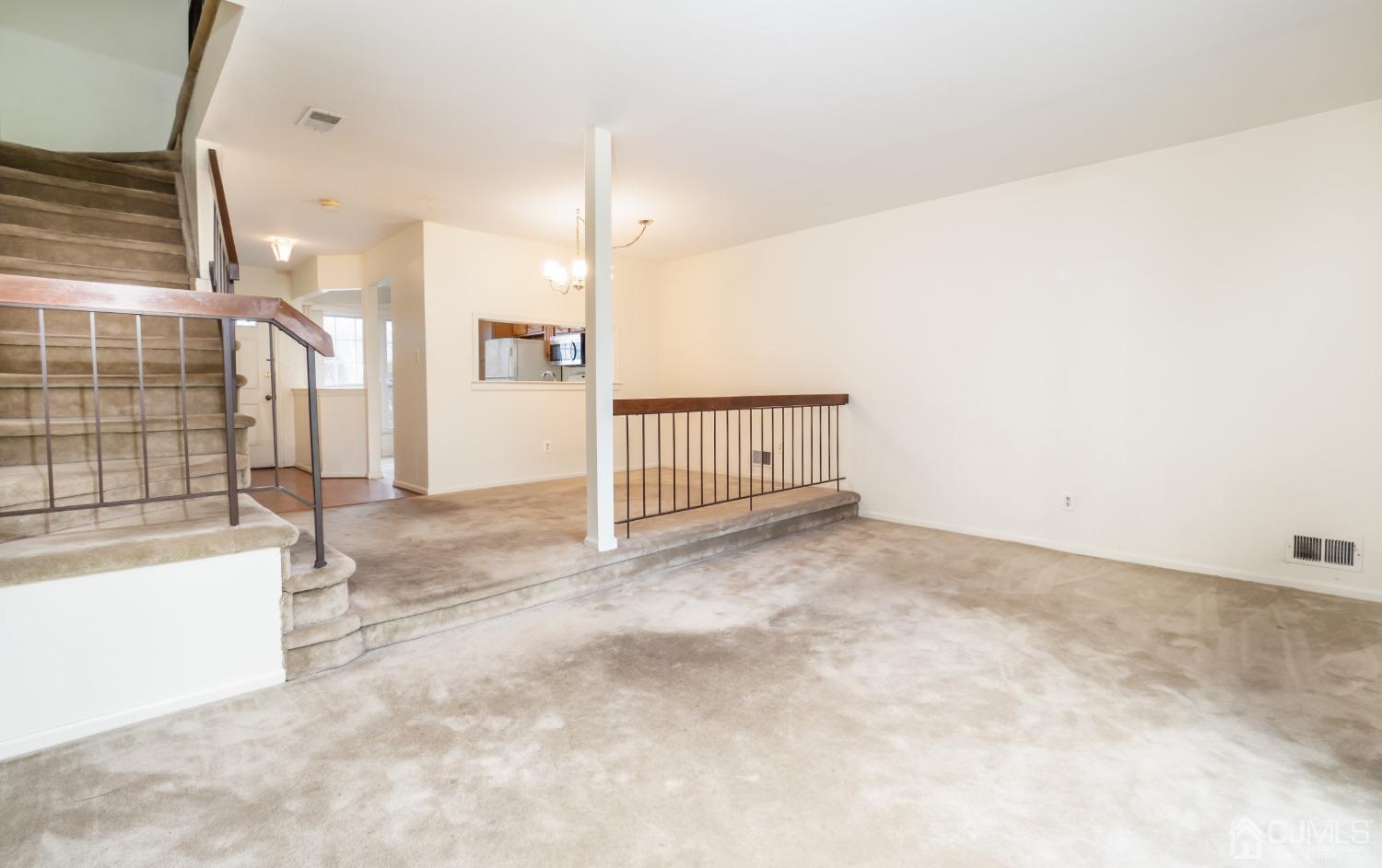 1403 Maplecrest Road Edison, NJ 08820 - Photo 11 of 23 a view of an empty room with a window