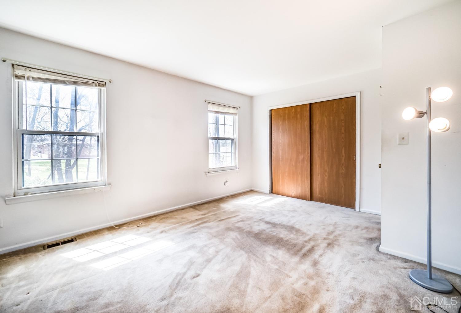1403 Maplecrest Road Edison, NJ 08820 - Photo 14 of 23 a view of an empty room with a window