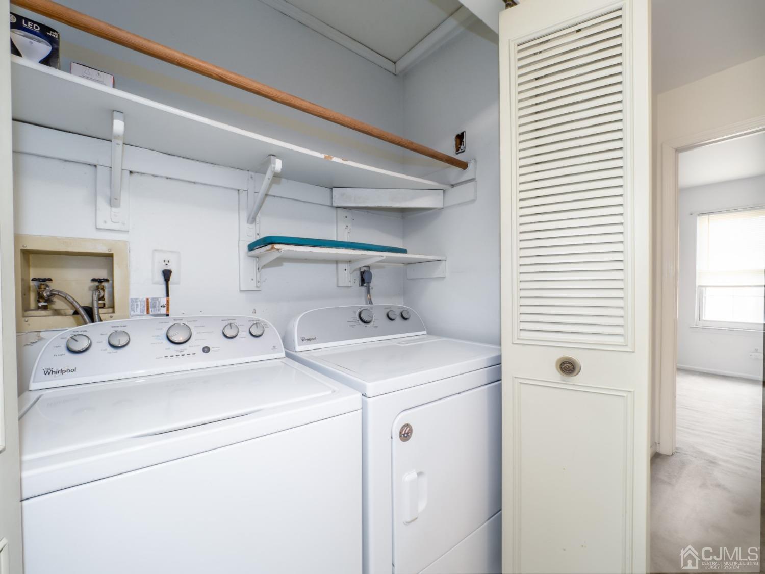 1403 Maplecrest Road Edison, NJ 08820 - Photo 17 of 23 a utility room with dryer and washer