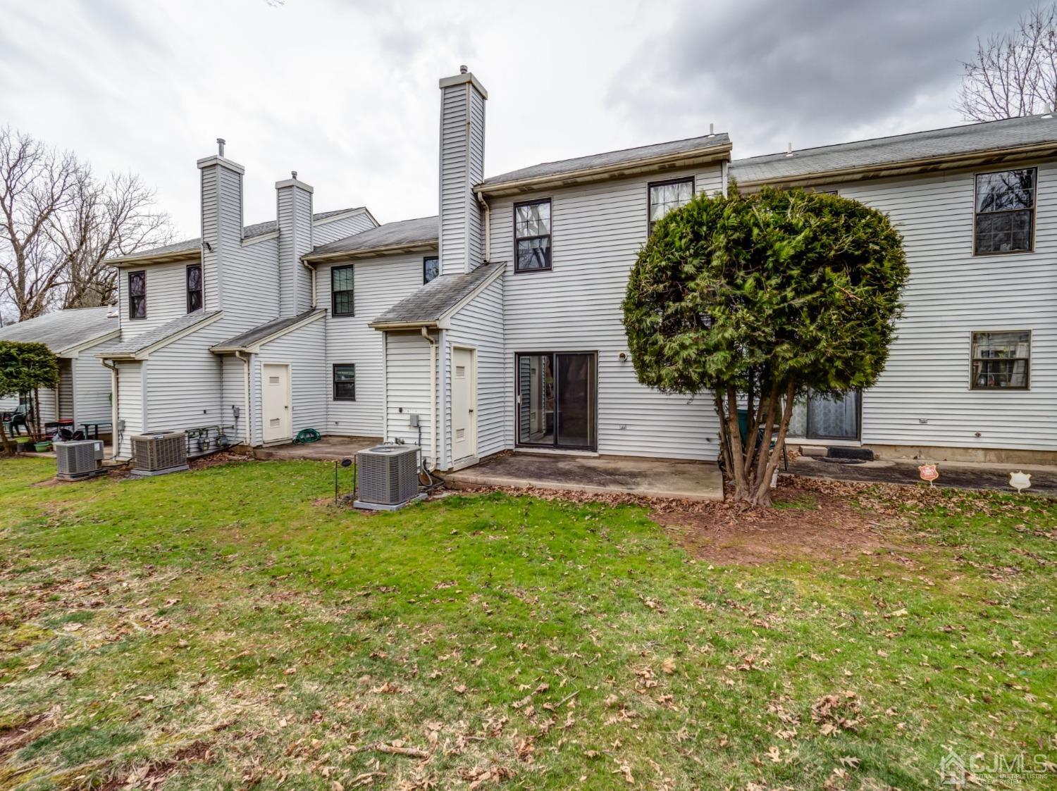 1403 Maplecrest Road Edison, NJ 08820 - Photo 20 of 23 a view of a house with a yard
