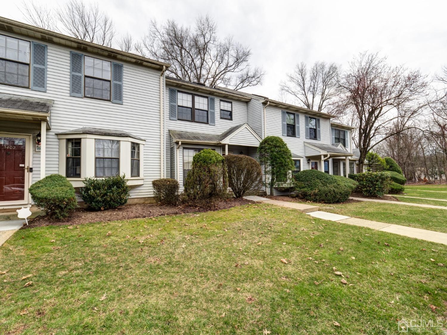 1403 Maplecrest Road Edison, NJ 08820 - Photo 2 of 23 a front view of a house with a yard