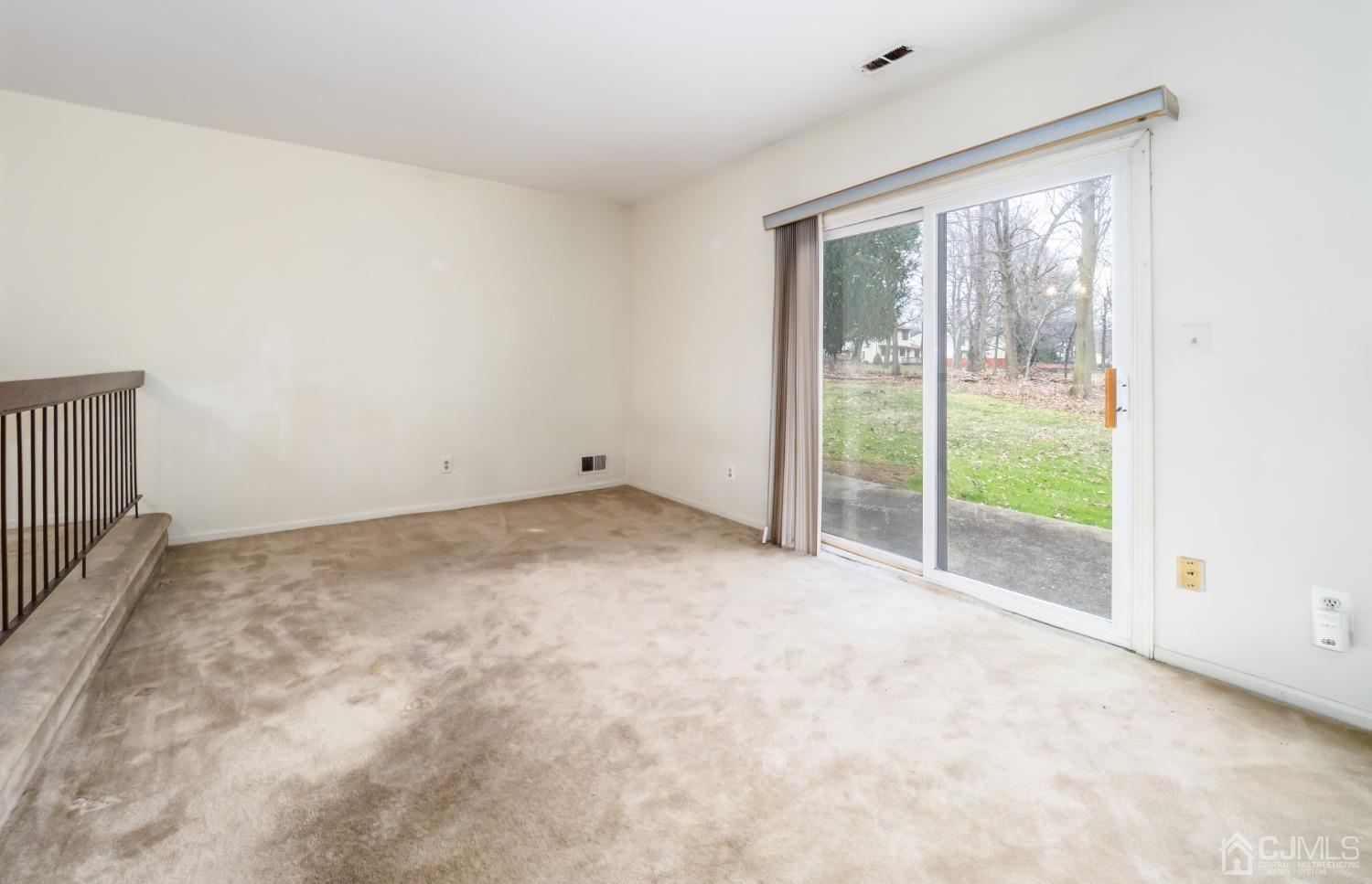 1403 Maplecrest Road Edison, NJ 08820 - Photo 9 of 23 a view of room with window and ceiling fan