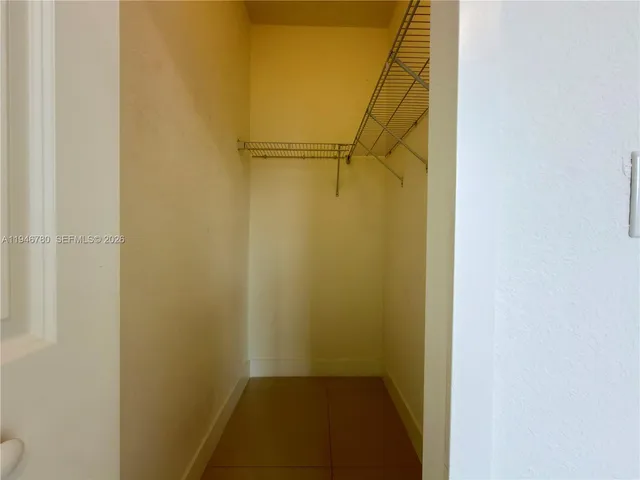 a bathroom with a glass door