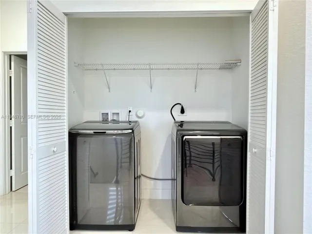 a utility room with closet