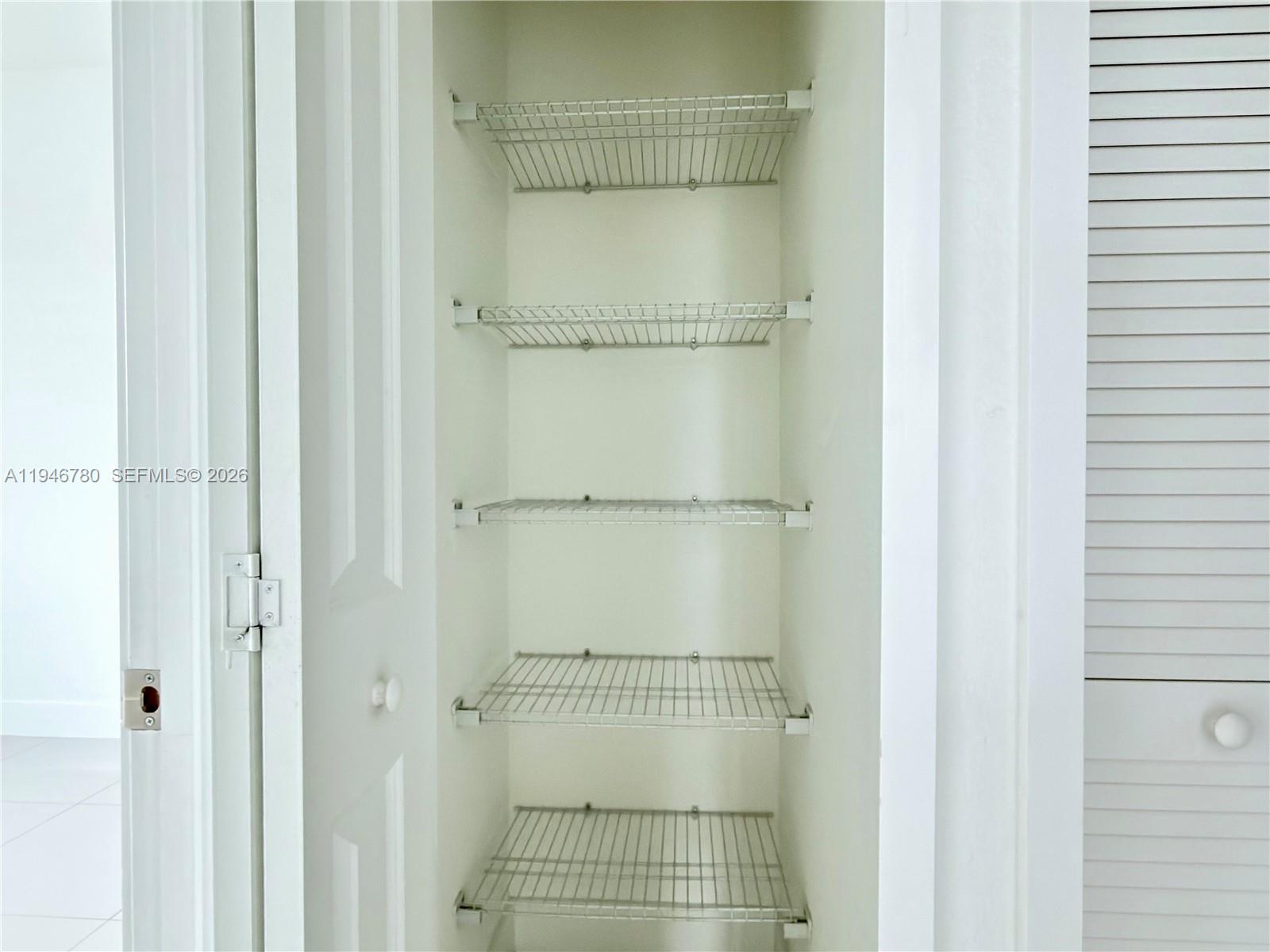 404 Southwest 91st Court Miami, FL 33174 - Photo 19 of 21 a bathroom with a glass shower door