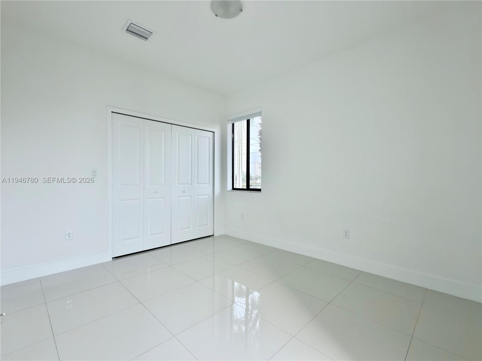 404 Southwest 91st Court Miami, FL 33174 - Photo 10 of 21 a view of an empty room