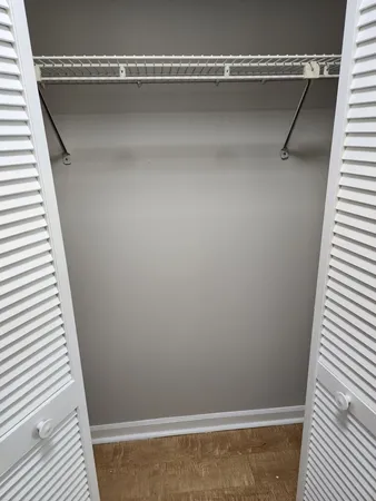 a view of a room with racks on the wall