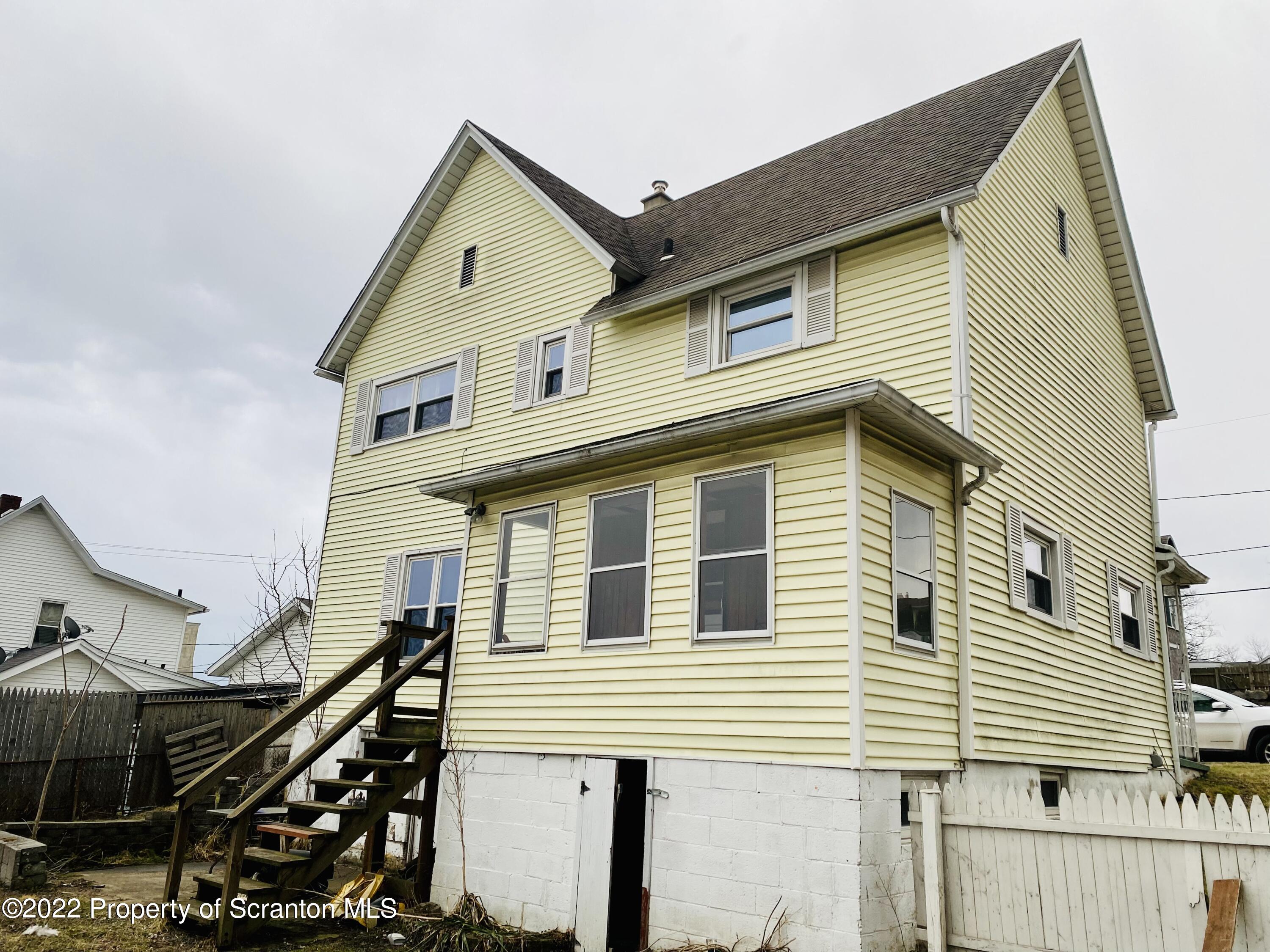 1102 Pierce Street Scranton, PA 18508 - Photo 3 of 10 a front view of a house with a stairs