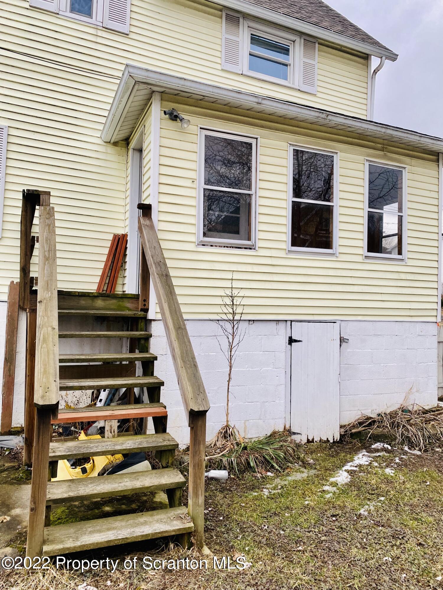1102 Pierce Street Scranton, PA 18508 - Photo 4 of 10 a view of a back yard of the house