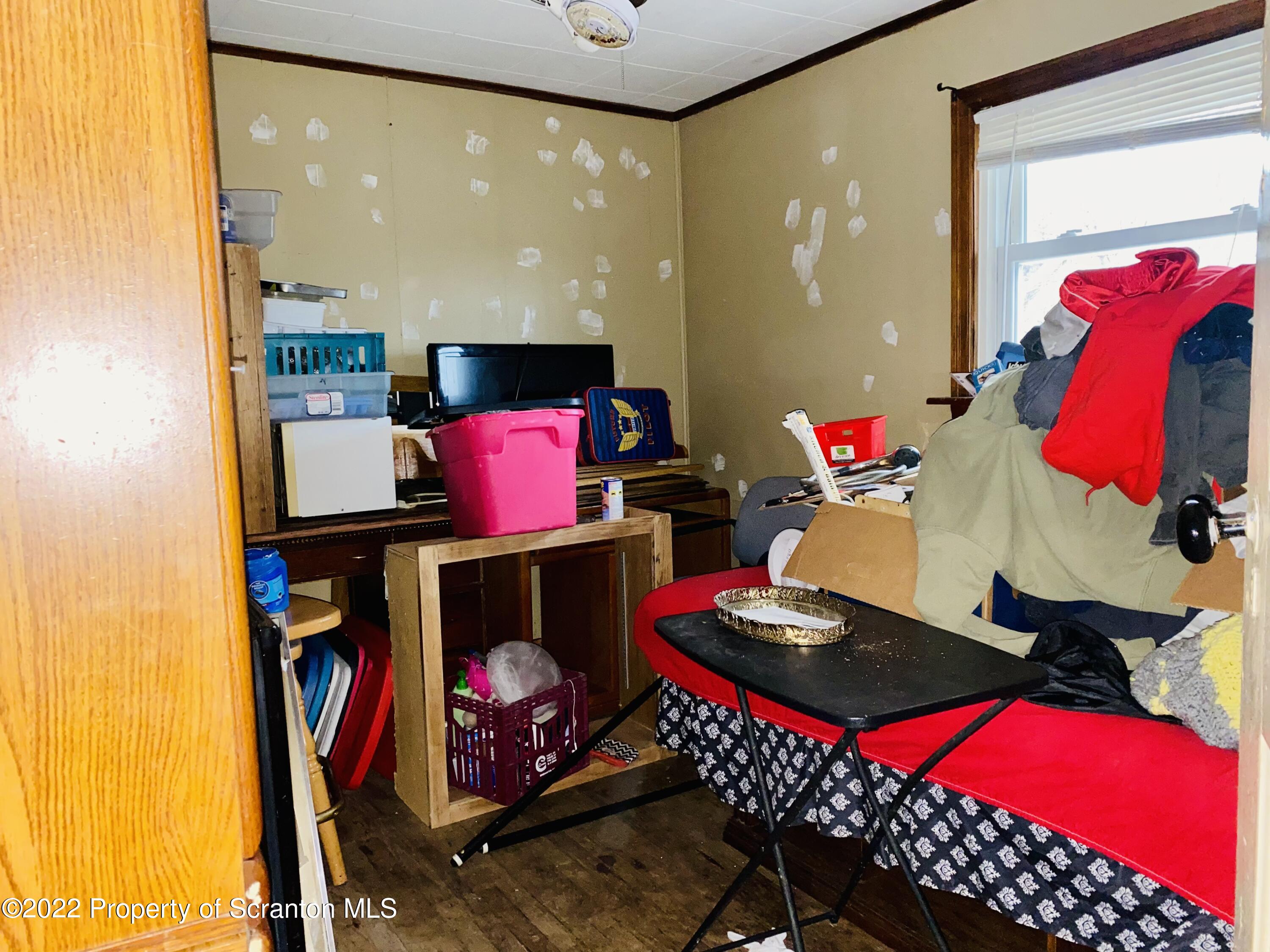 1102 Pierce Street Scranton, PA 18508 - Photo 10 of 10 a living room with furniture and a fireplace