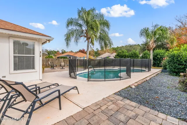 a view of a backyard with a patio