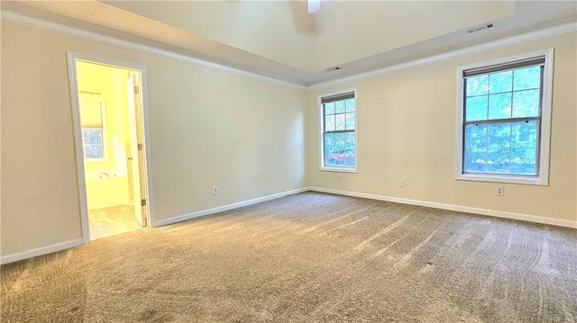 an empty room with windows