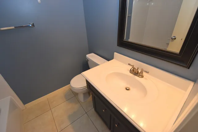 a close up of a bathtub in a bathroom