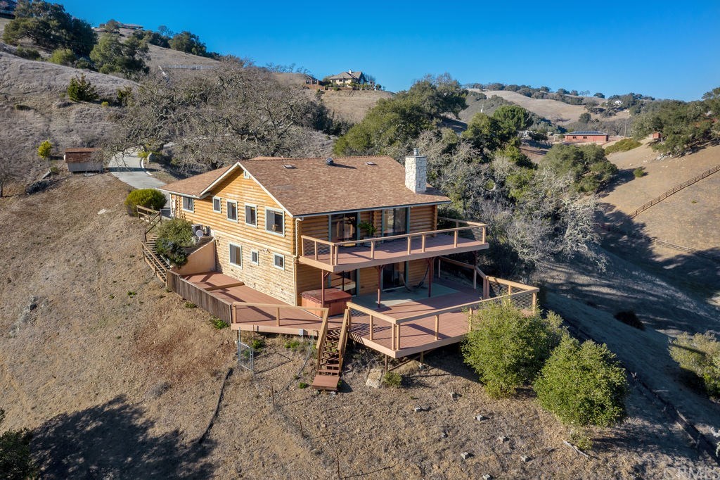 10205 San Lucas Road Atascadero, CA 93422 - Photo 1 of 1 an aerial view of a house with a garden