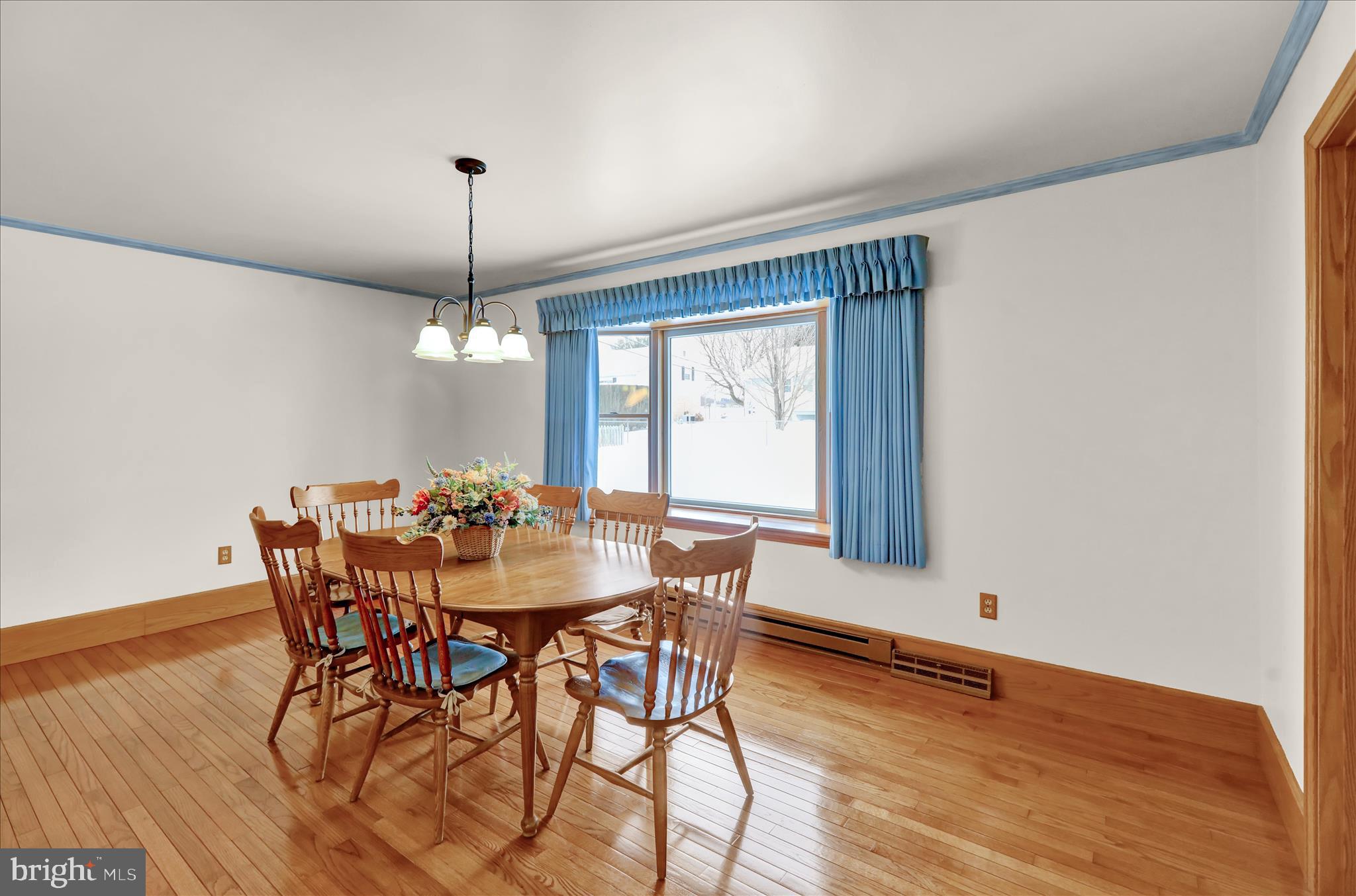 2904 Gerard Avenue Reading, PA 19608 - Photo 17 of 39 a view of a dining room with furniture window and wooden floor