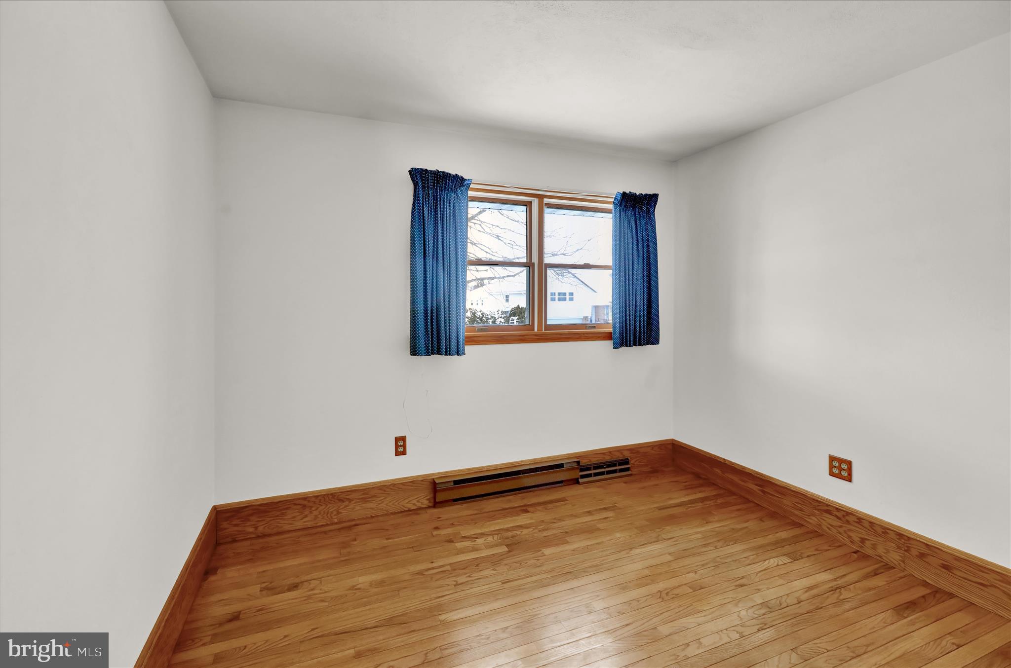 2904 Gerard Avenue Reading, PA 19608 - Photo 25 of 39 a view of a room with wooden floor and window