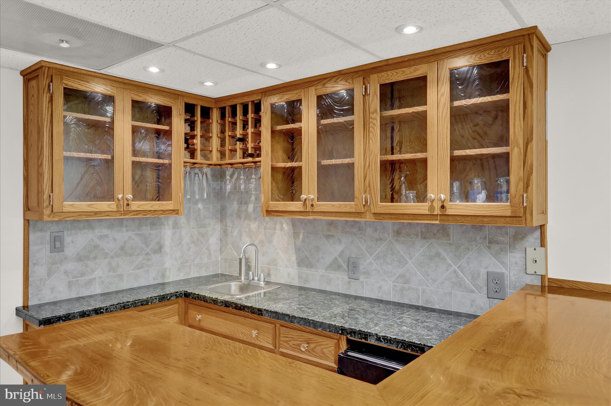 2904 Gerard Avenue Reading, PA 19608 - Photo 30 of 39 a view of a kitchen with a sink and cabinets