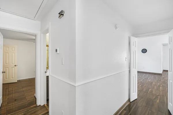 a view of a bathroom from the hallway