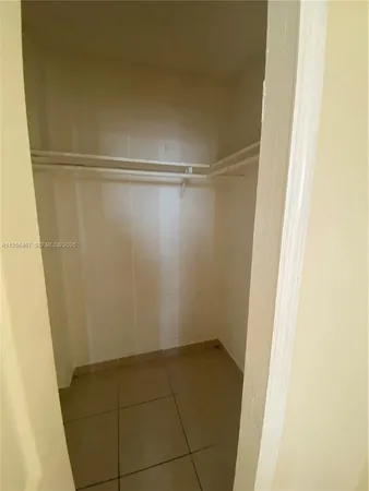 a bathroom with a sink a toilet and a shower