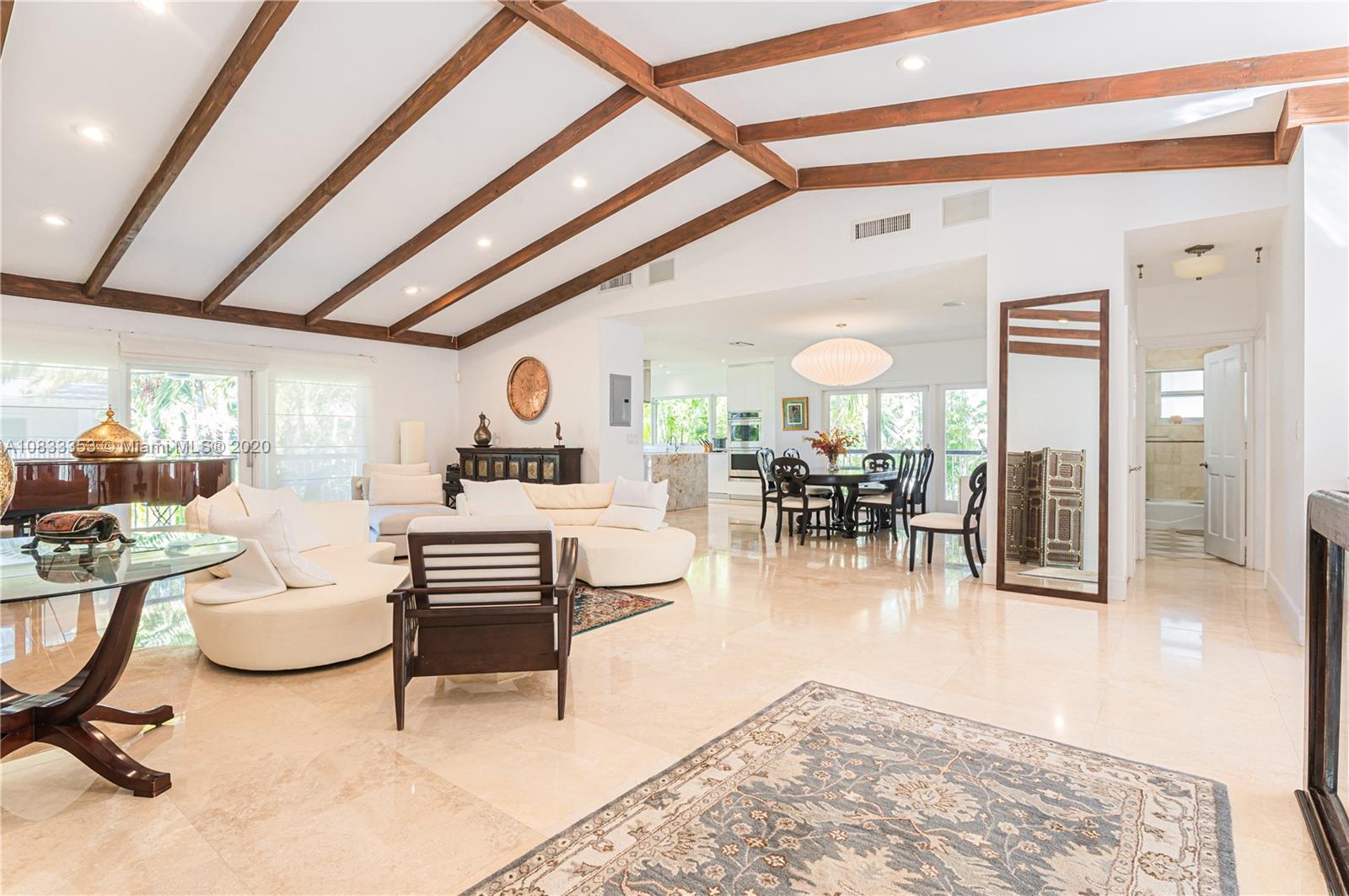 472 Warren Lane Key Biscayne, FL 33149 - Photo 12 of 39 a living room with furniture and a flat screen tv