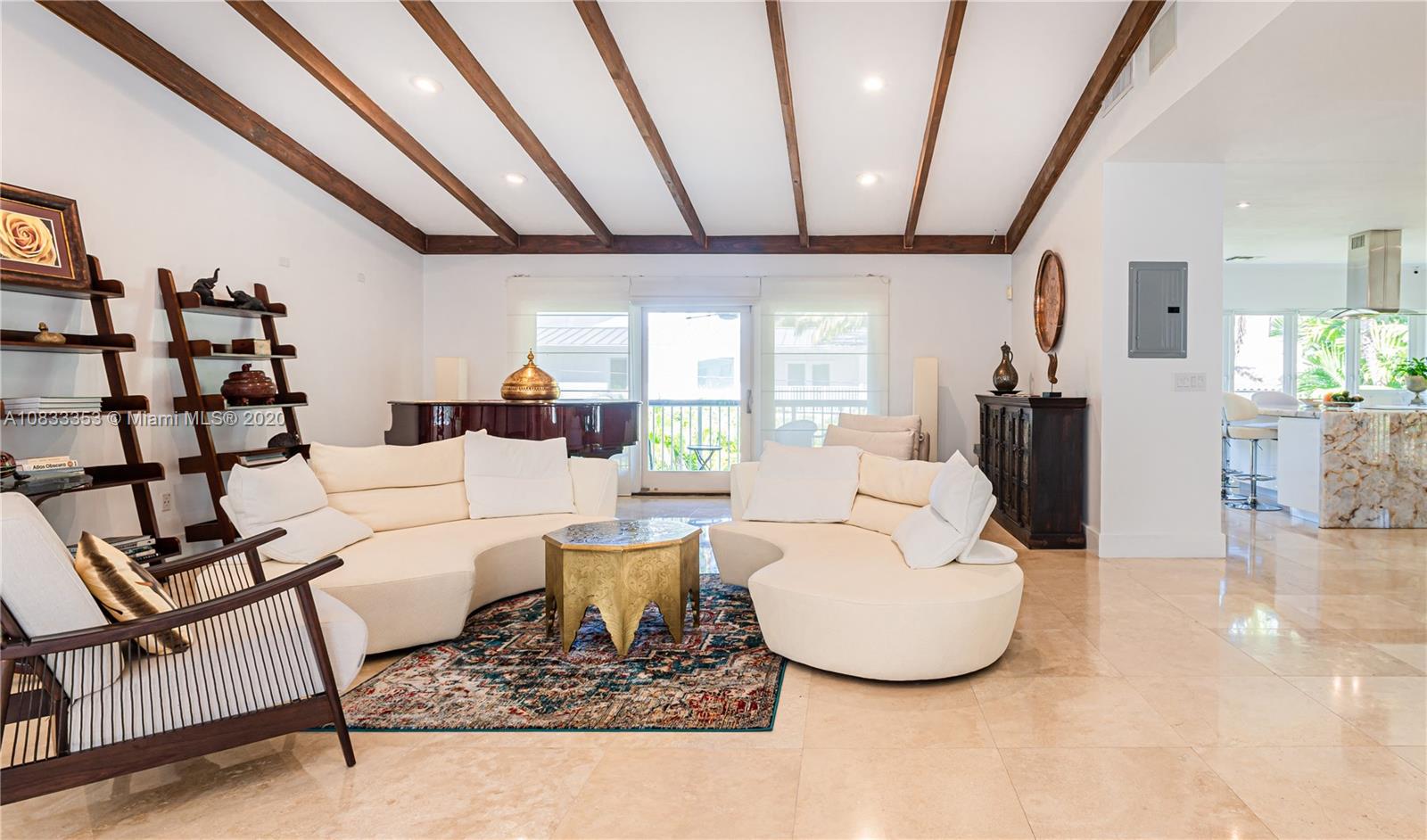 472 Warren Lane Key Biscayne, FL 33149 - Photo 13 of 39 a living room with furniture and a large window