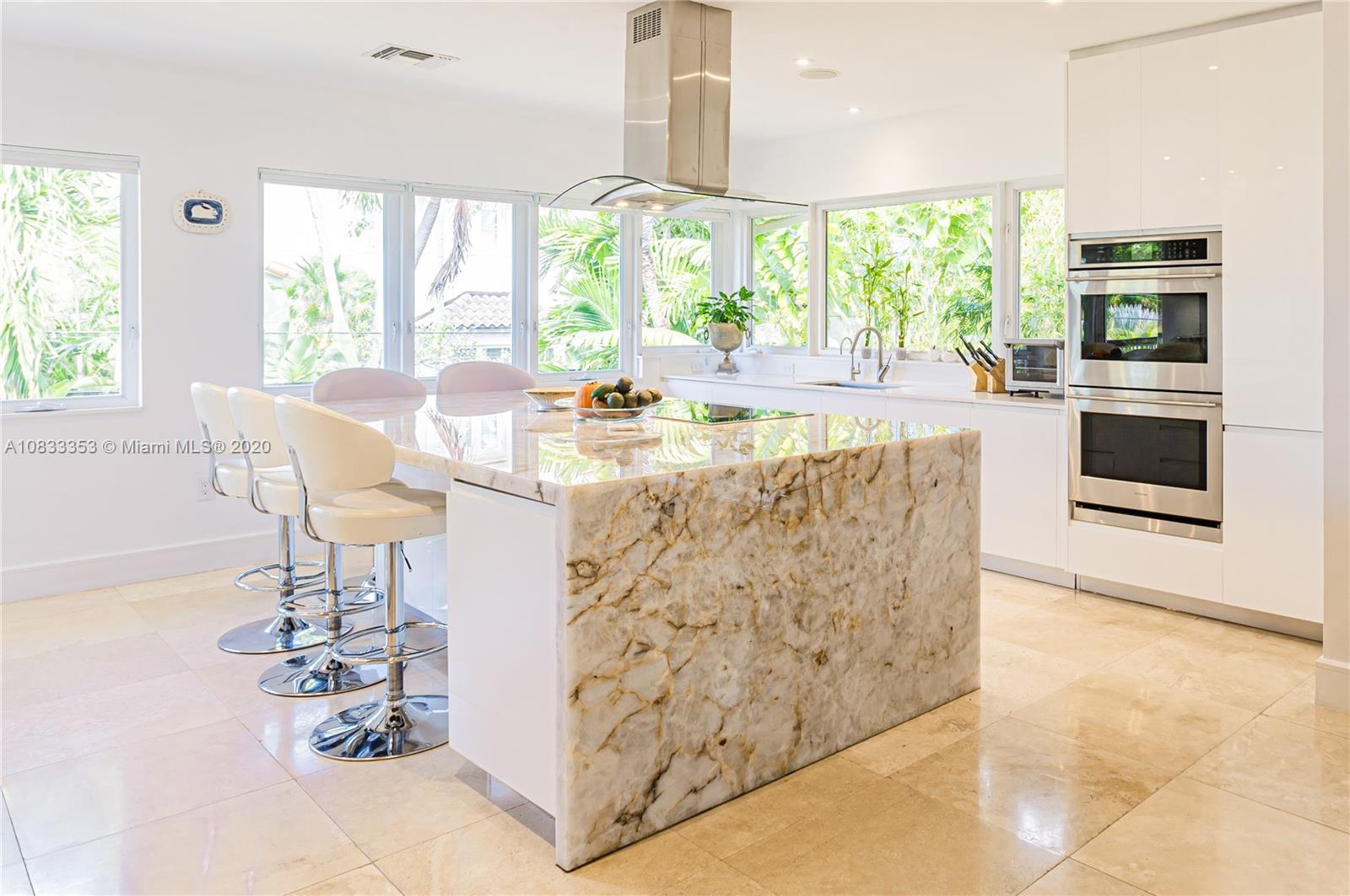 472 Warren Lane Key Biscayne, FL 33149 - Photo 18 of 39 a living room with fireplace furniture and a large window