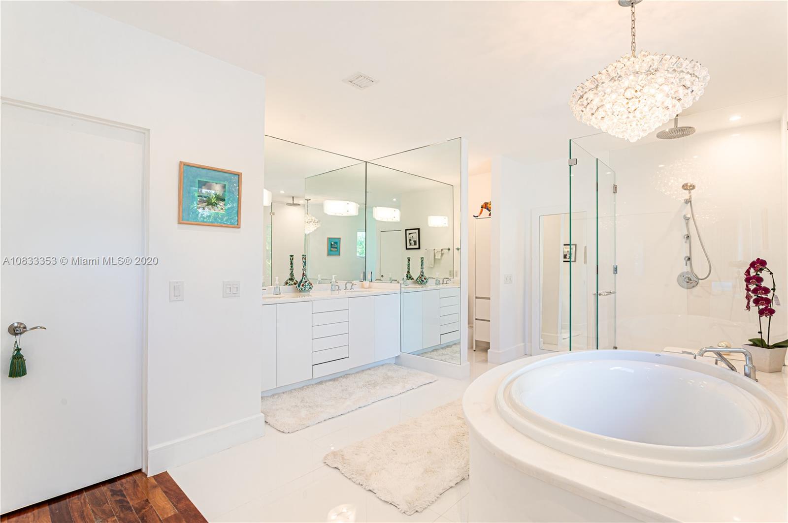 472 Warren Lane Key Biscayne, FL 33149 - Photo 22 of 39 a bathroom with a sink a toilet and shower