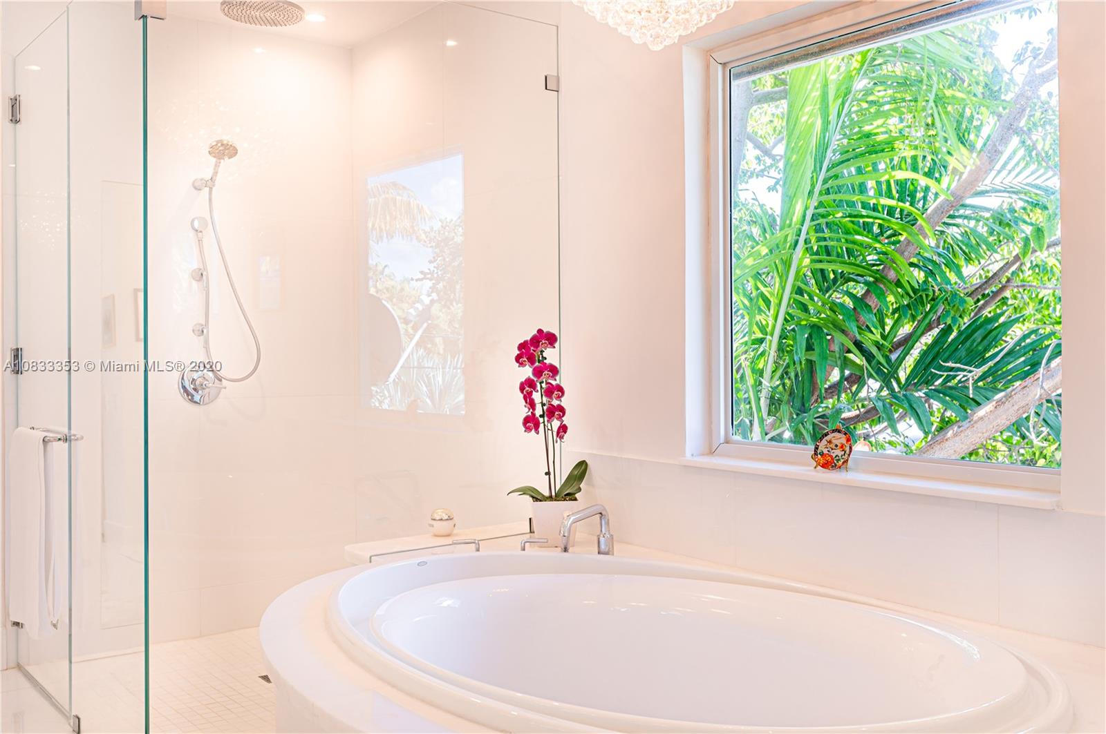 472 Warren Lane Key Biscayne, FL 33149 - Photo 23 of 39 a bathroom with a sink and a window