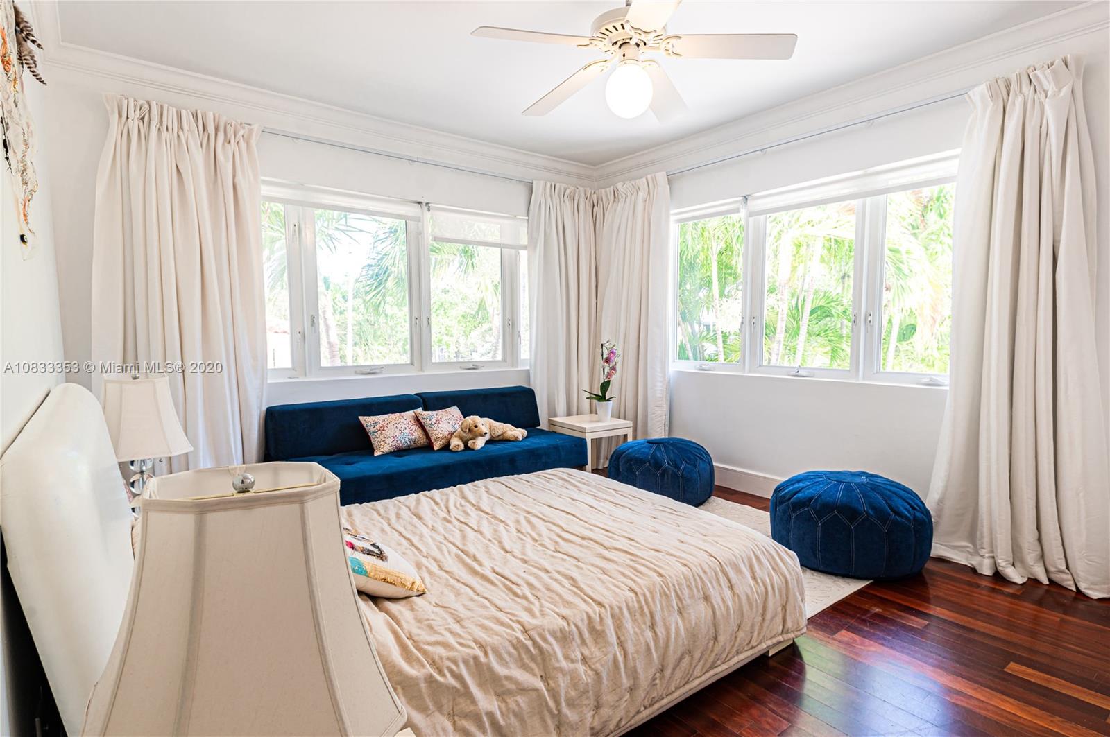 472 Warren Lane Key Biscayne, FL 33149 - Photo 29 of 39 a bedroom with two beds and a large window