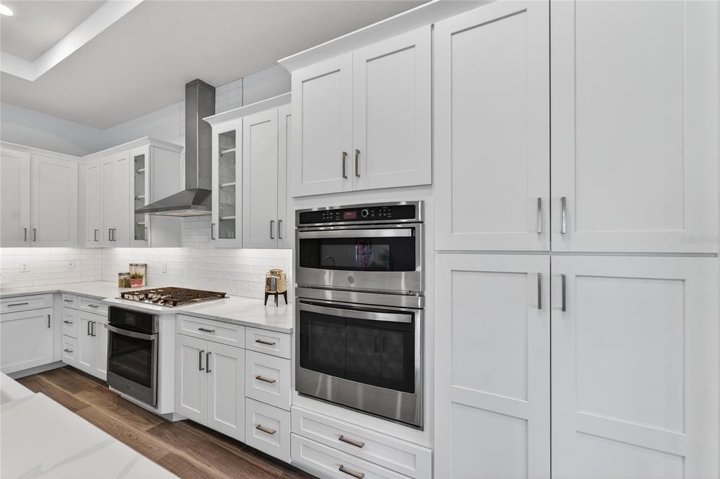 1071 Seagrape Drive Ruskin, FL 33570 - Photo 15 of 100 a kitchen with cabinets stainless steel appliances and sink