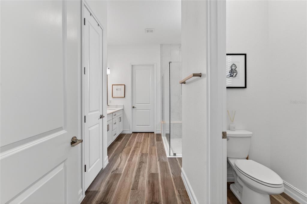 1071 Seagrape Drive Ruskin, FL 33570 - Photo 29 of 100 a bathroom with a sink and toilet