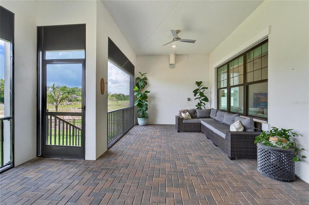 1071 Seagrape Drive Ruskin, FL 33570 - Photo 68 of 100 a living room with furniture and a potted plant