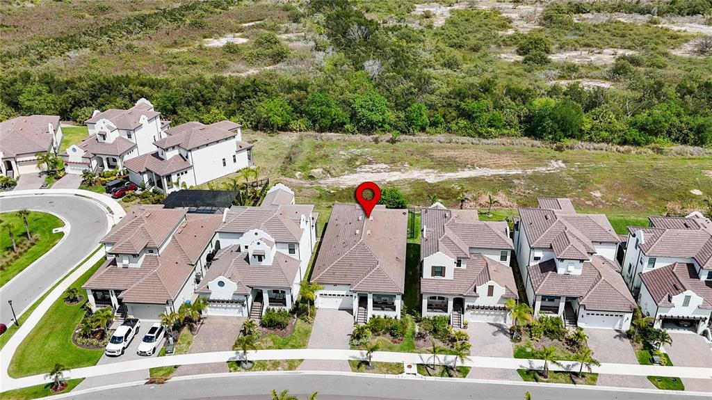 1071 Seagrape Drive Ruskin, FL 33570 - Photo 74 of 100 an aerial view of residential houses with outdoor space and swimming pool