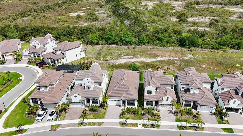 1071 Seagrape Drive Ruskin, FL 33570 - Photo 75 of 100 an aerial view of residential houses with outdoor space and street view